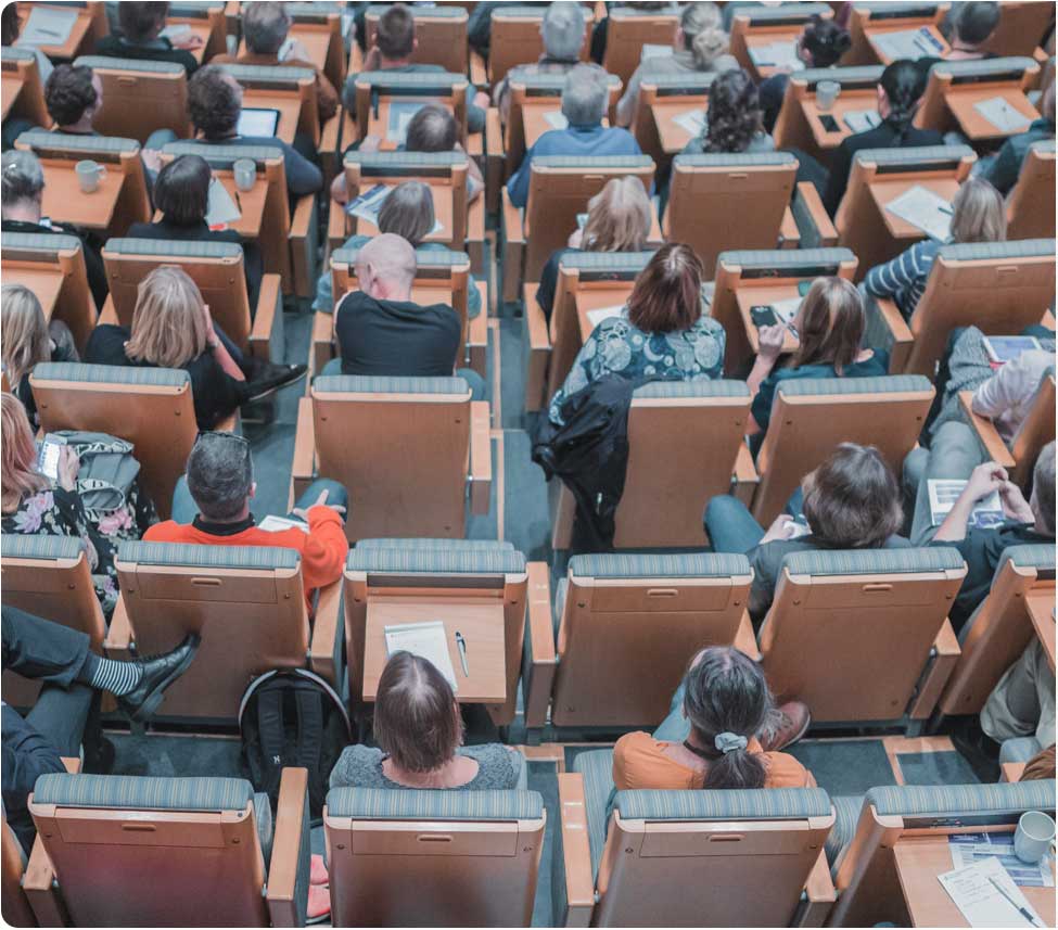 Students seated in a classroom auditorium