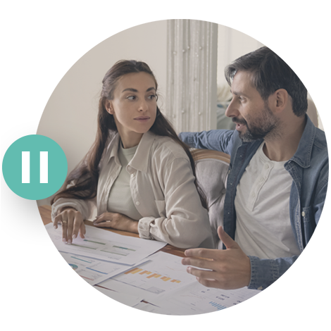 Couple pausing to discuss an investment decision