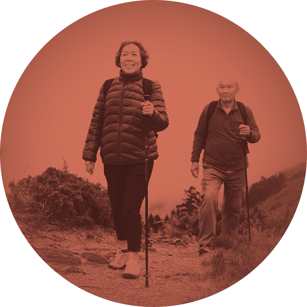 Older adults hiking on a mountain trail